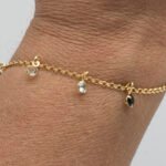 Pulseira Zircônias Cristal e Preta Penduradas Banhada em Ouro 18K